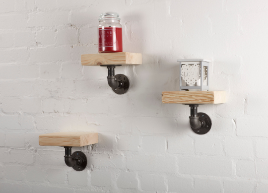 single shelf made from reclaimed wood and industrial steel pipe shelf brackets