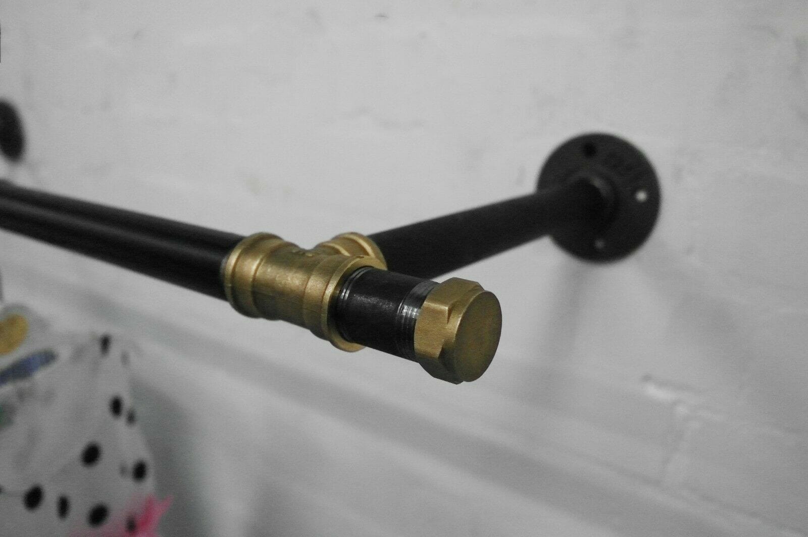industrial black steel and brass pipe tee style wall mounted clothes rail