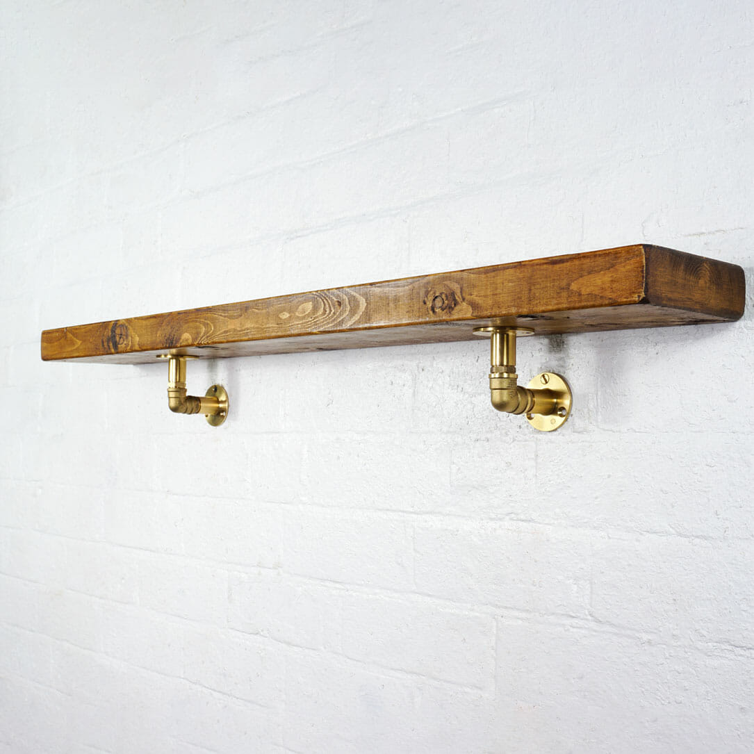 Full brass industrial pipe shelf brackets with reclaimed wooden shelf