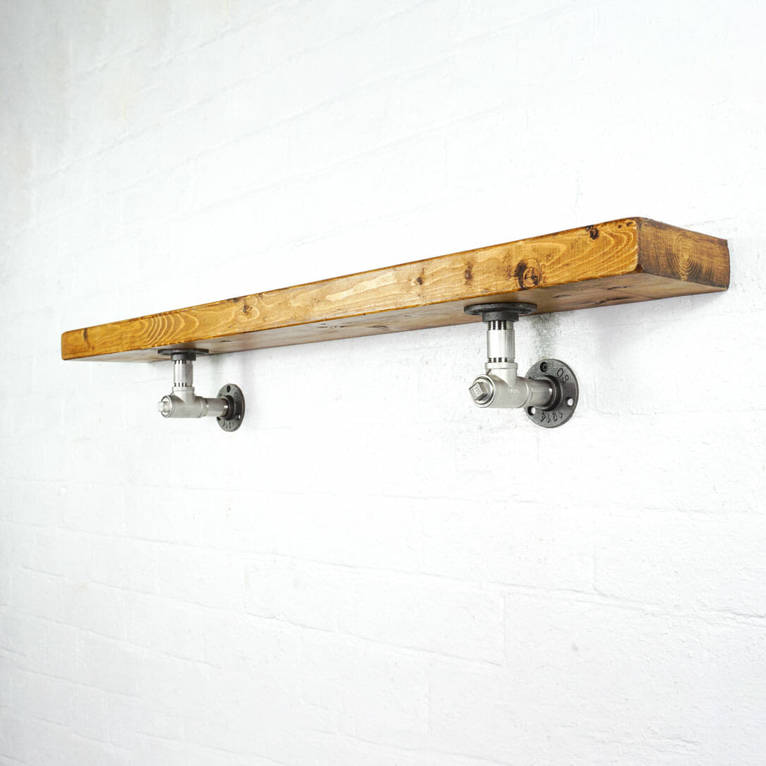 Stainless steel industrial pipe tee nut shelving brackets with reclaimed wood scaffolding board shelf