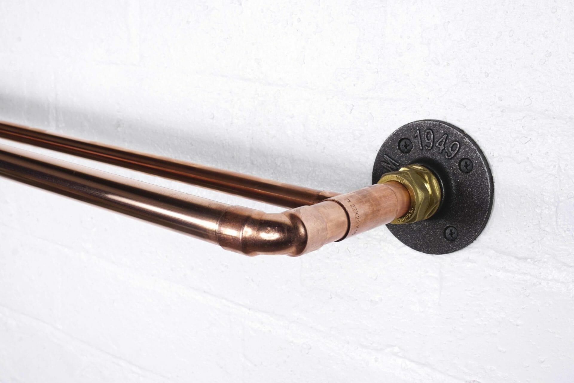 Double curtain rail made from copper industrial pipe