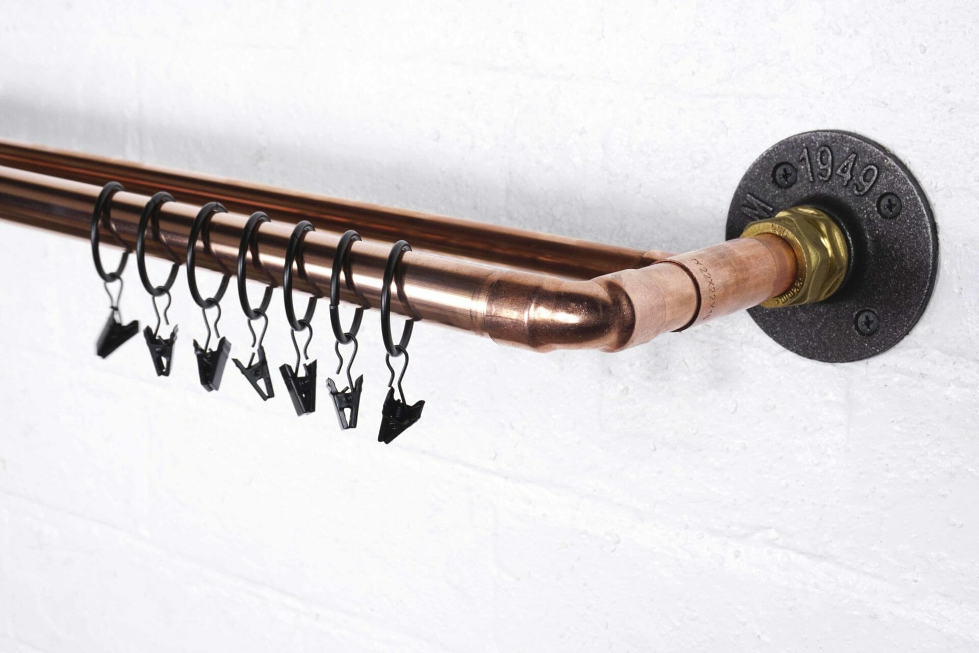 Double curtain rail made from copper industrial pipe