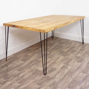 Reclaimed wooden kitchen table with black steel hairpin legs