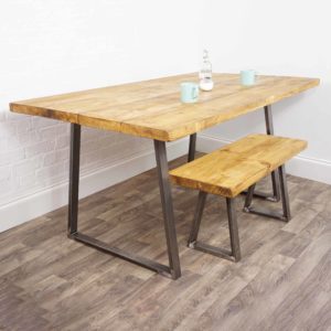 reclaimed wooden table with trapezium raw steel legs