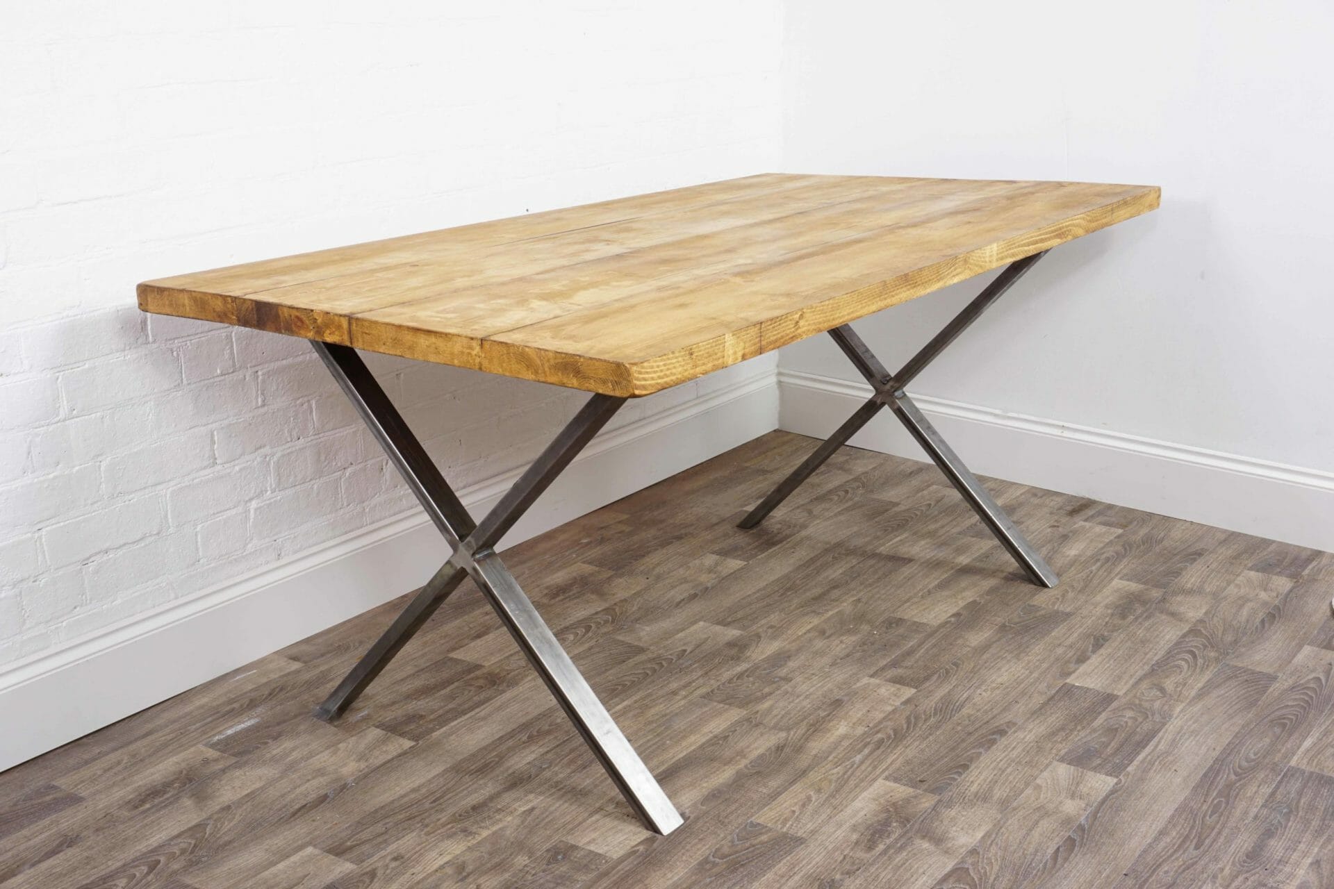 reclaimed wooden table with x raw steel legs