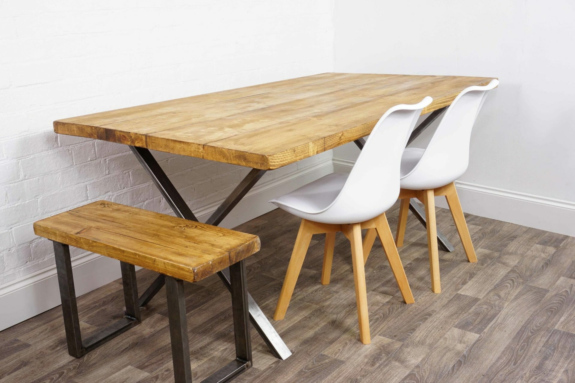 reclaimed wooden table with x raw steel legs