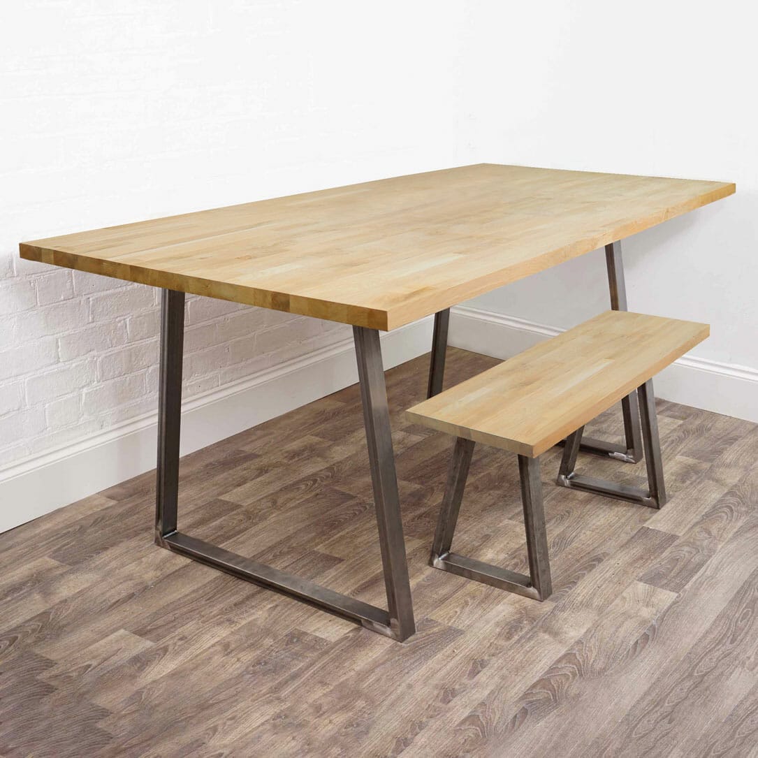 Solid wooden table and bench with steel trapezium legs