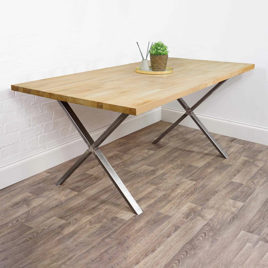 Solid wooden table with raw steel x legs