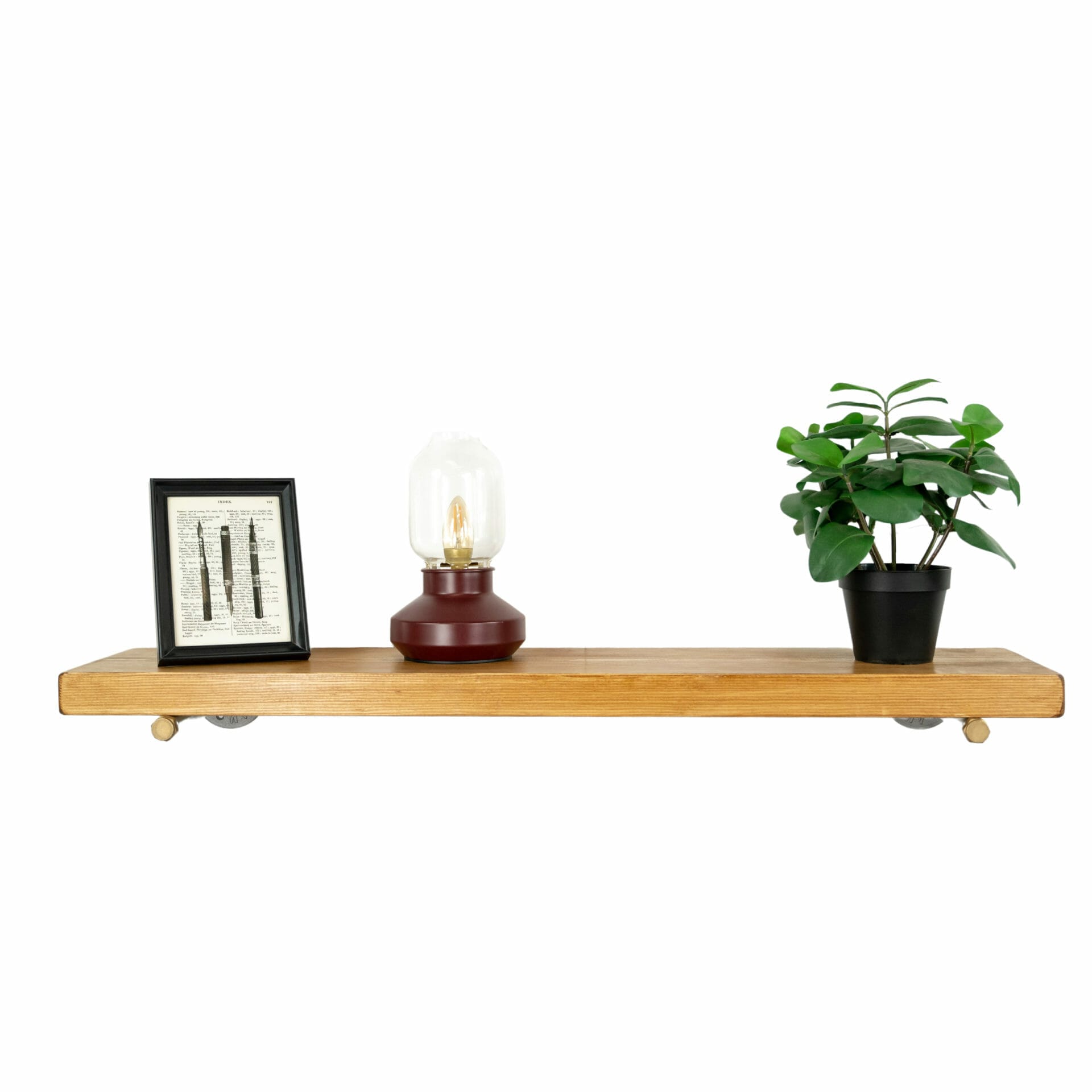 Industrial Silver and brass floating shelf bracket front holding shelf and items