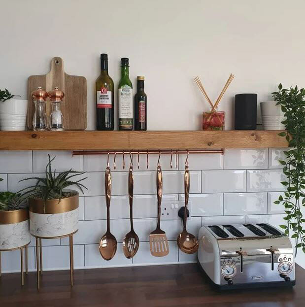 kitchen shelf with copper rail